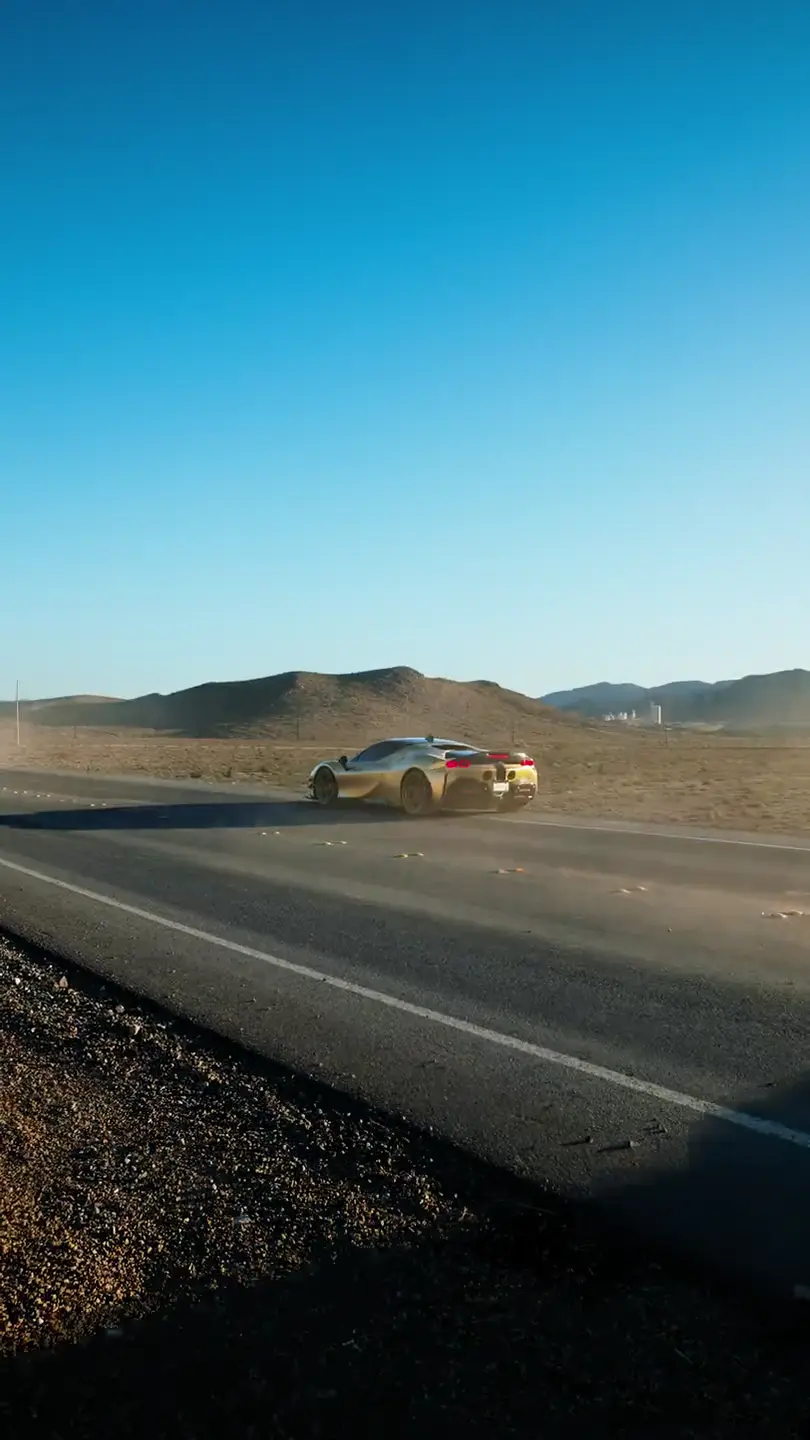 Exotic rental car on a desert road near Las Vegas