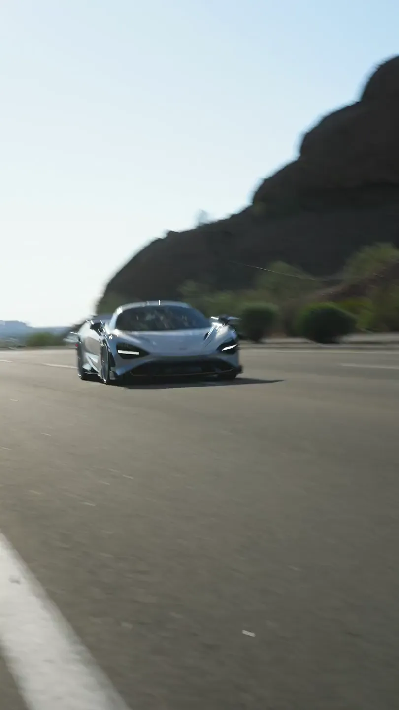 Exotic rental car on a desert highway in Arizona
